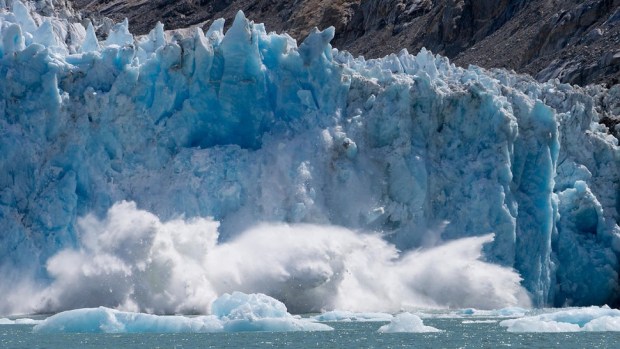 WATCH A TIDEWATER GLACIER CRASH INTO THE OCEAN
