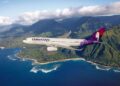 Which USA airlines offer lie-flat seats to Hawaii?