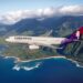 Which USA airlines offer lie-flat seats to Hawaii?